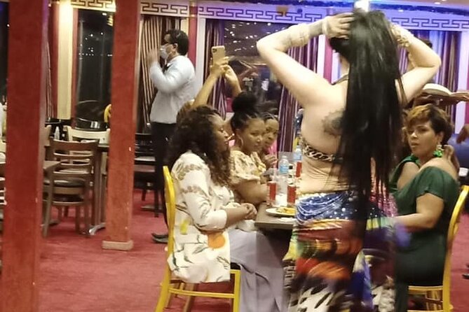 Cairo Dinner Cruise in Nile River With Belly Dancer & Tanora show - Your 2-hour cruise setup, ships, and what you get for the money