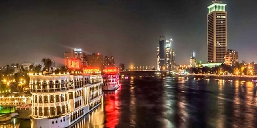 Cairo: Nile Dinner Cruise with Belly Dancer Show and Music - City lights from the Nile: the photo and atmosphere payoff