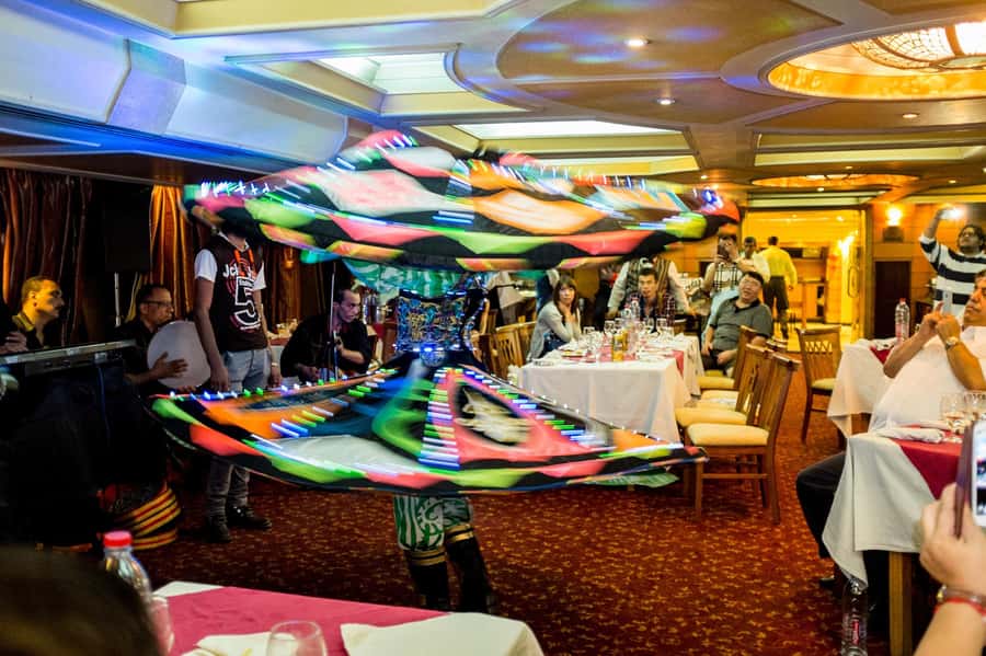Cairo: Nile Sunset Dinner Cruise, Show & Optional Transfer - The show on board: belly dancing, folklore, and live music