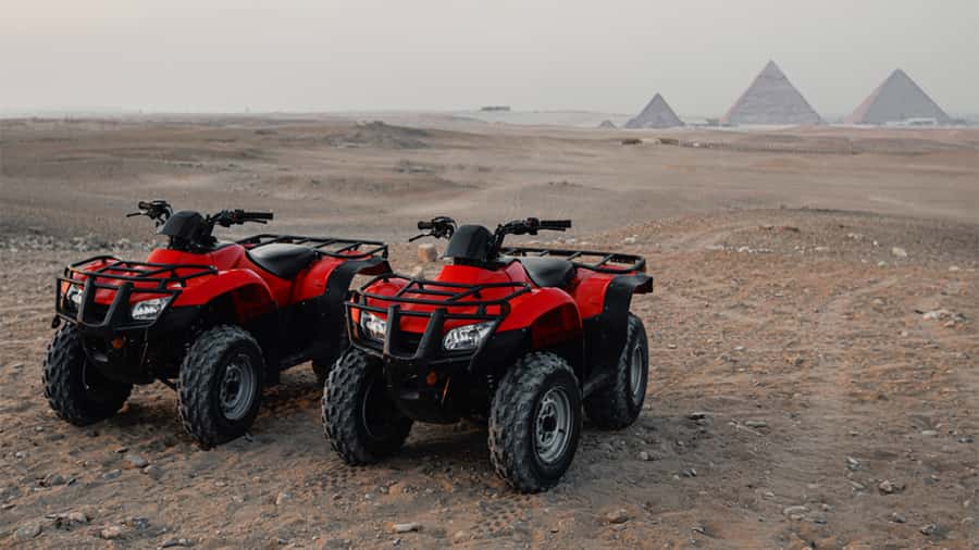 Cairo: Private Quad Bike Desert Tour with Pyramids & Sunset - Sunset with a camel and a proper show