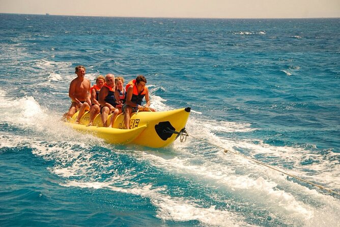 Dolphin tour & banana boat fun with snorkeling from Hurghada - Banana boats and sofa boats: fun, but weather calls the shots