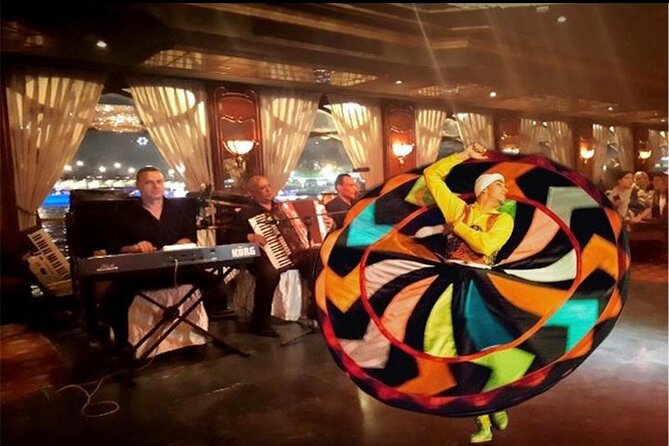 Evening Dinner Nile Cruise in Cairo with Private Transport - Entertainment you actually came for: live band, belly dancers, and Tanoura
