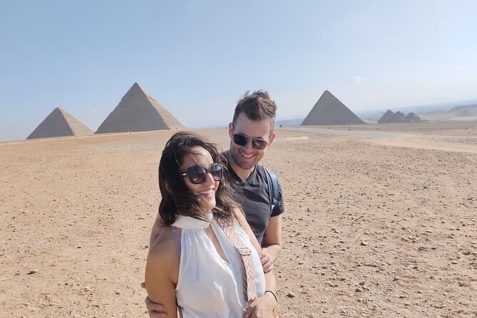 Full day tour to Giza pyramids, Sphinx, Memphis and Saqqara - Stop 1: Giza Pyramids, Three Pyramids at Once, and the Seven Wonders Angle