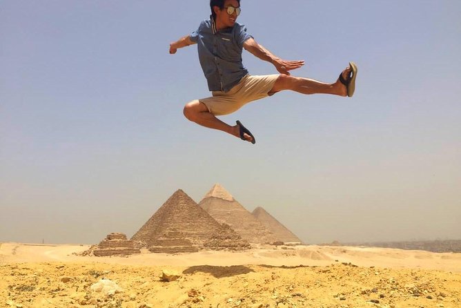 Full Day Tour to Giza Pyramids with Camel Ride and Egyptian Museum in Cairo - The Great Sphinx: the head, the consensus, and the mood