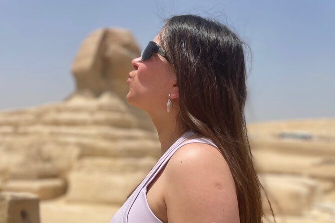 Giza Pyramids, Sphinx, Egyptian Museum day tour with a guide - The panoramic view ride: three pyramids, queen pyramids, and better angles