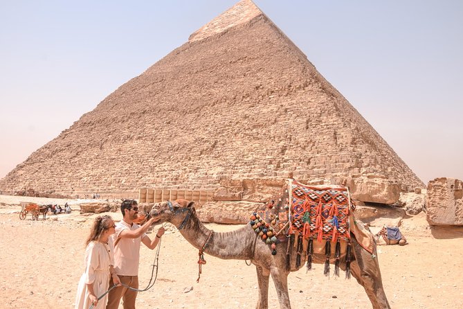 Half day Guided tour to Giza pyramids Sphinx with 1 Hour Camel ride - Valley Temple and pyramid views from the camel path
