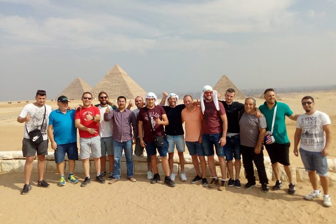 Half Day Tour To Giza Pyramids & The Great Sphinx With Camel Ride - Great Pyramid of Khufu: The First Stop for Instant Scale