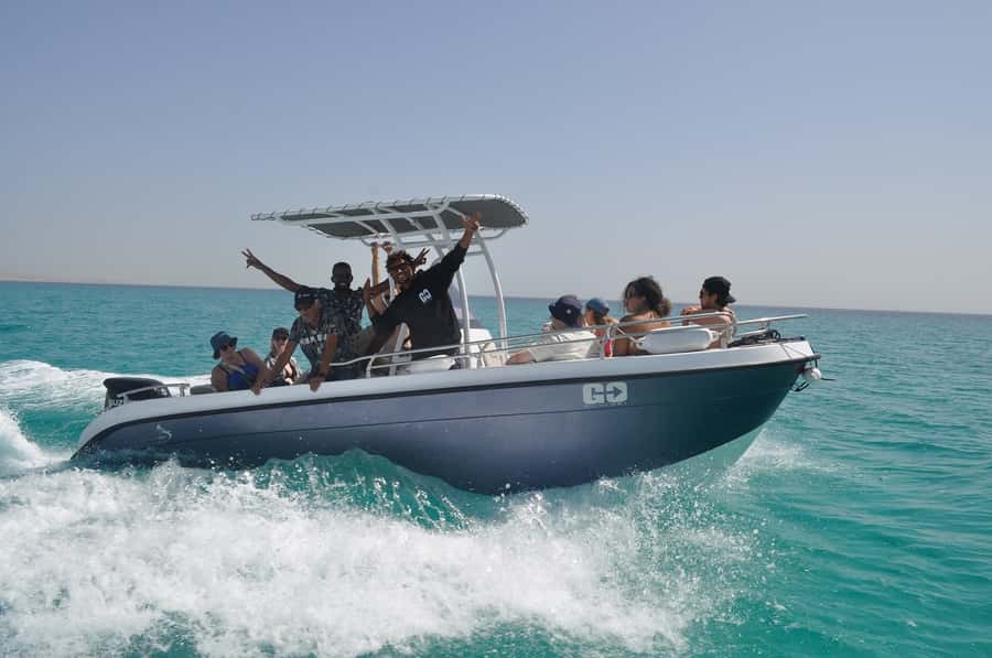 Hurghada: Orange Bay Dolphin Watching, Snorkeling & Lunch - Orange Bay islands: beach time, swimming breaks, and your lunch