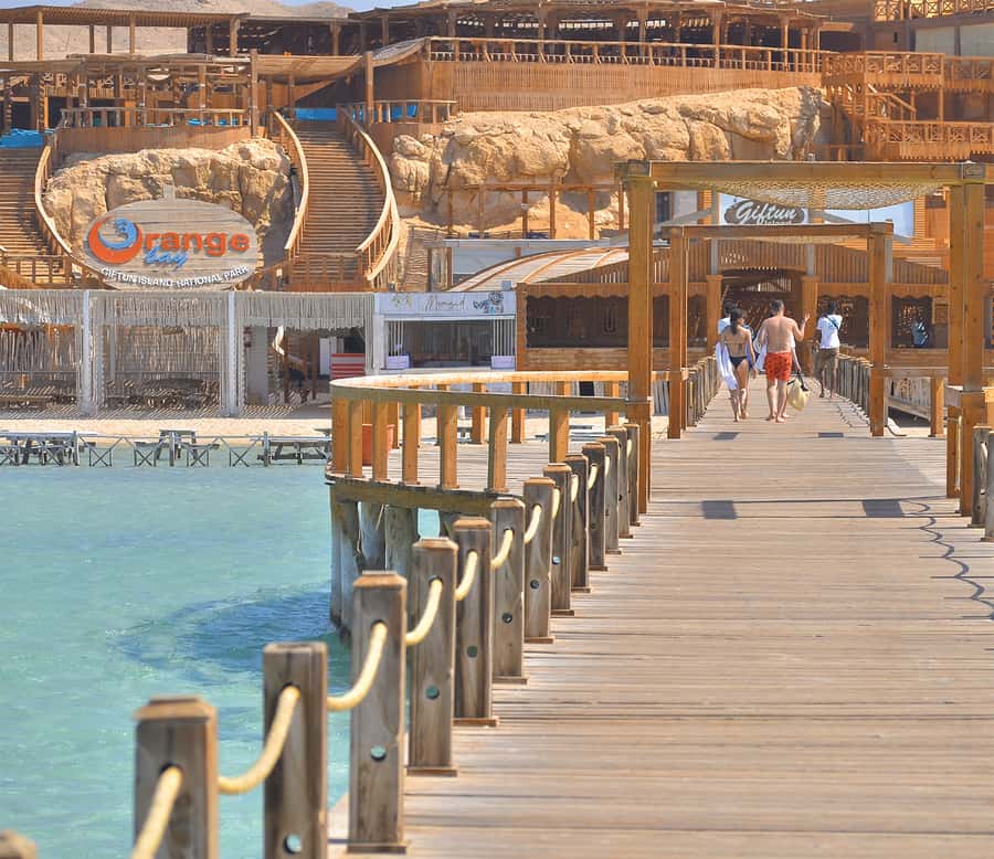 Hurghada: Premium Orange Island Cruise with Lunch & Transfer - Orange Bay island time: white sand, shallow water, and photo-friendly beach calm