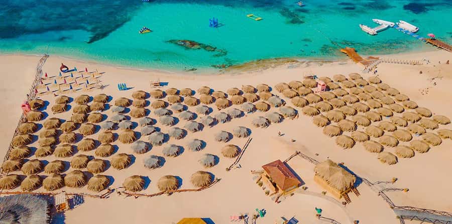 Hurghada Sunset Paradise Island Tour With Snorkeling & Lunch - How the day flows, from pickup to boat to island time