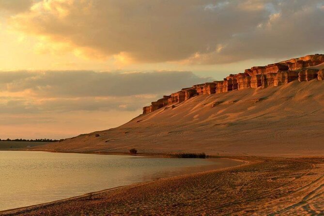 Private Tour to Whales Valley & Wadi El Rayan Waterfalls in El Fayoum from Cairo - Faiyum Oasis finale: Magic Lake and the desert payoff