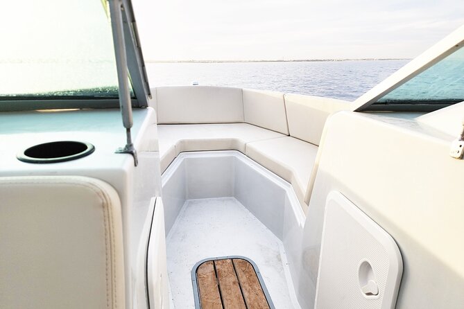 Red Sea: Orange Island Speedboat Full Day Tour with Lunch - Orange Bay time: white sand, shallow water, and reef-adjacent magic
