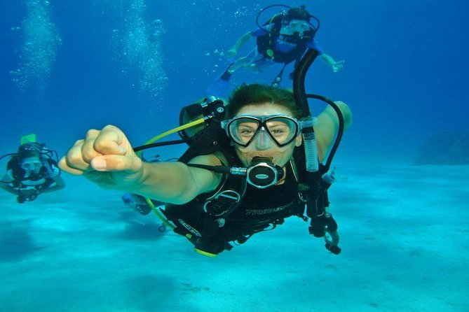 Scuba Diving Full Day Boat Trip for beginners With Lunch & Transfer - Hurghada - The day schedule: hotel pickup, two underwater stops, onboard lunch, back to Hurghada